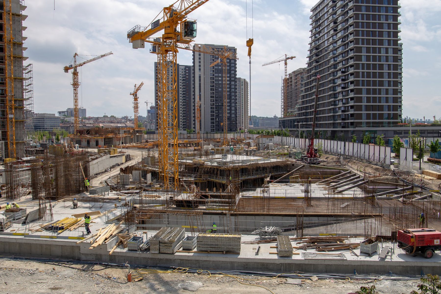 Tower cranes over a high-rise construction site